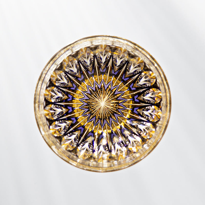 Top-down view of Hana Kagami Edo Kiriko rocks glass with purple and gold star-cut pattern | Kagami Crystal, Tokyo