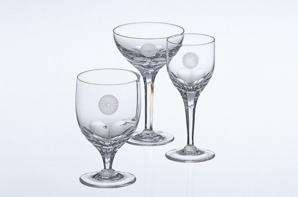 Crystal stemware with an engraved crest