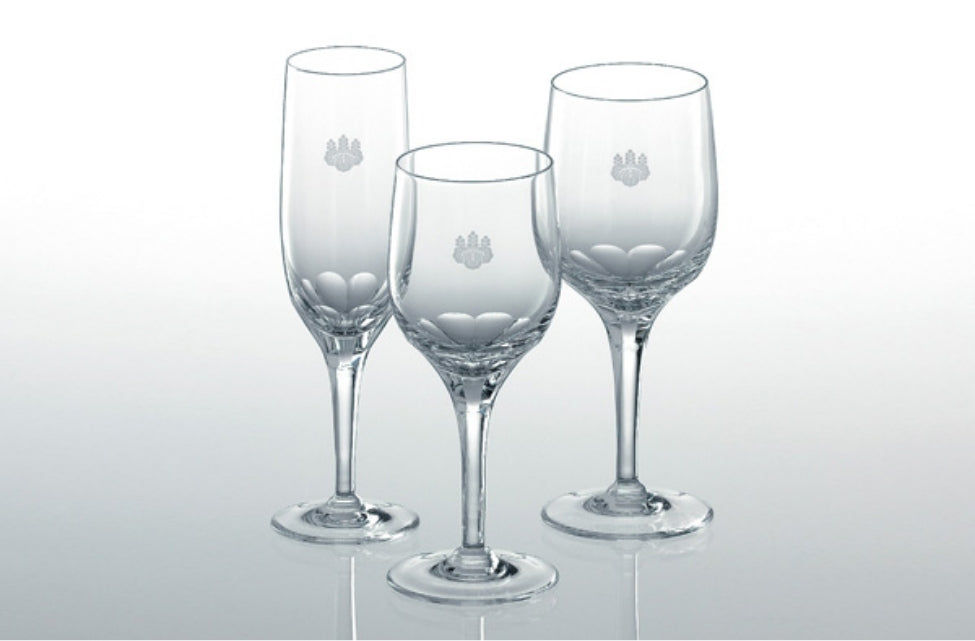 Crystal stemware engraved with a crest